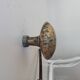 Pair of antique oval door handles in solid gold-plated brass.