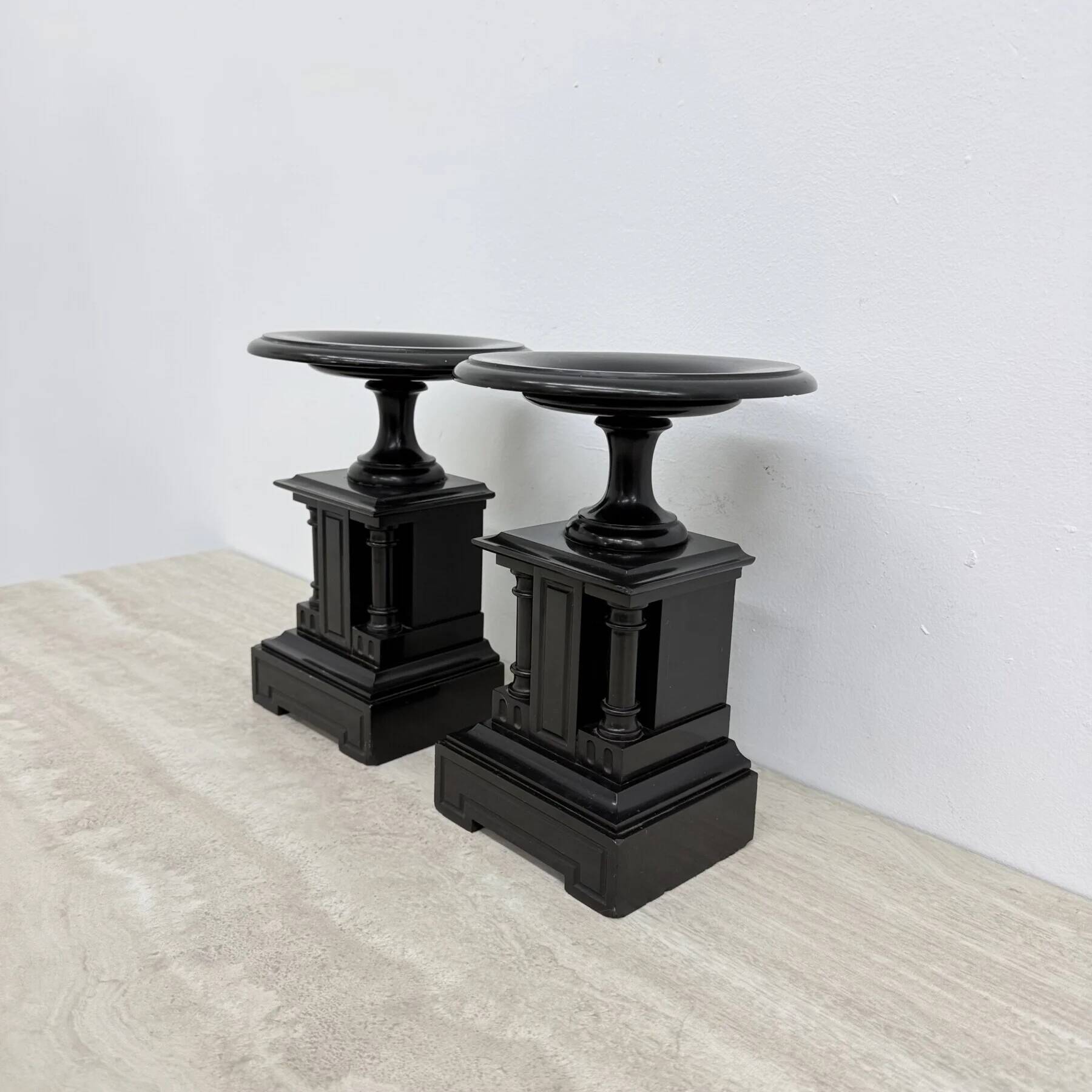 Antique French black marble cassoulets gilt decor pedestals neoclassical pair, 1900s