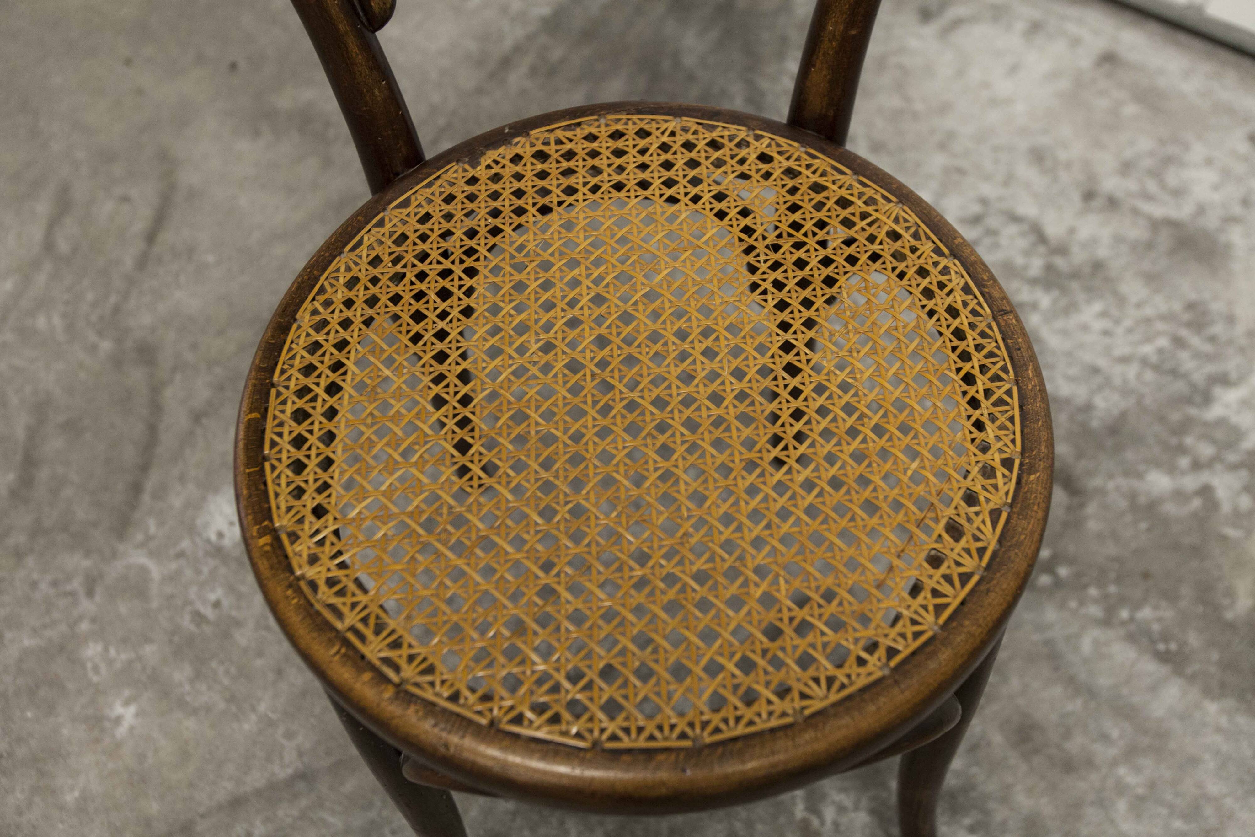 Ungvar Ungarn 1900 dark brown cane bistro chair