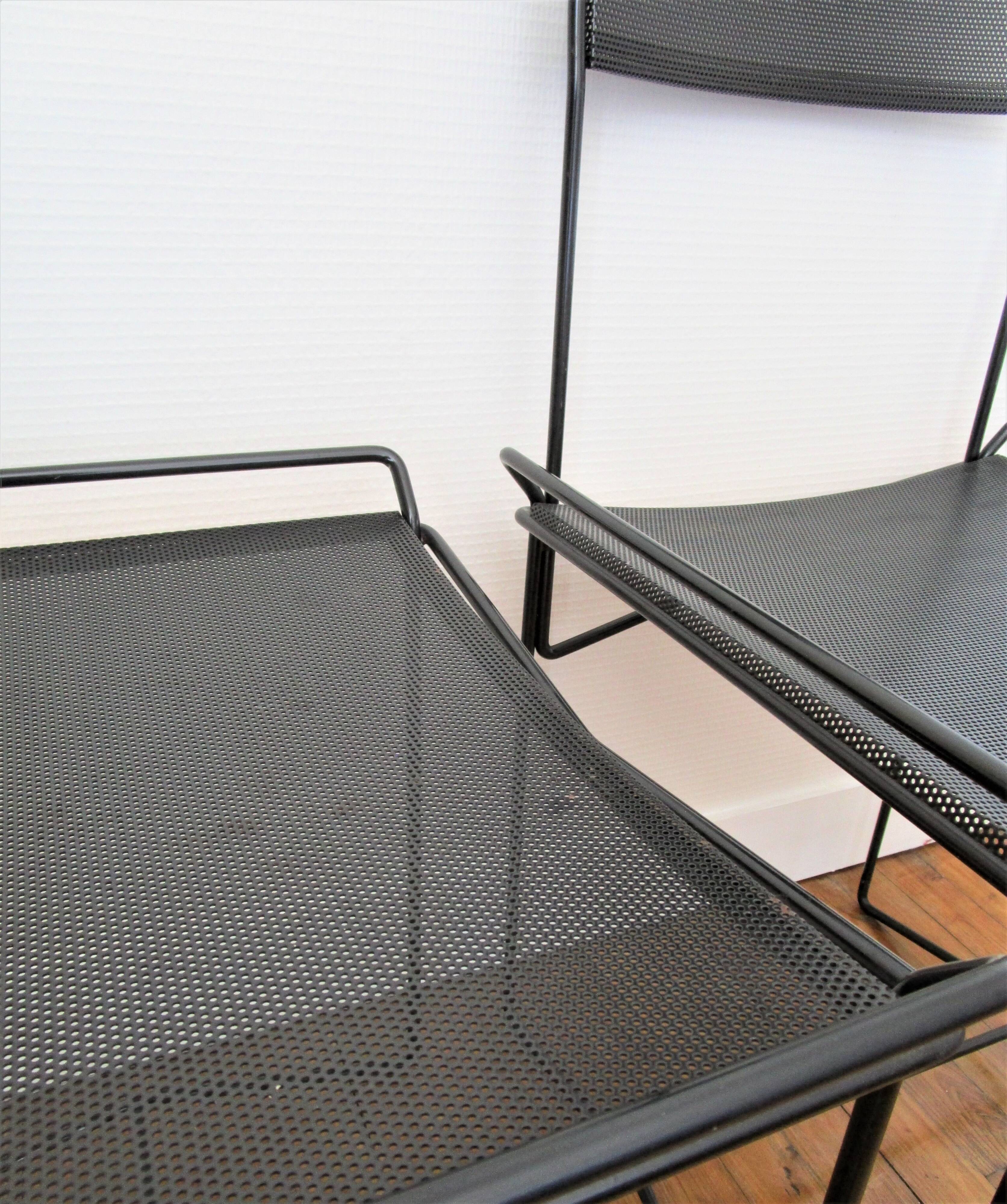 Pair of perforated metal steel chairs from the 80s