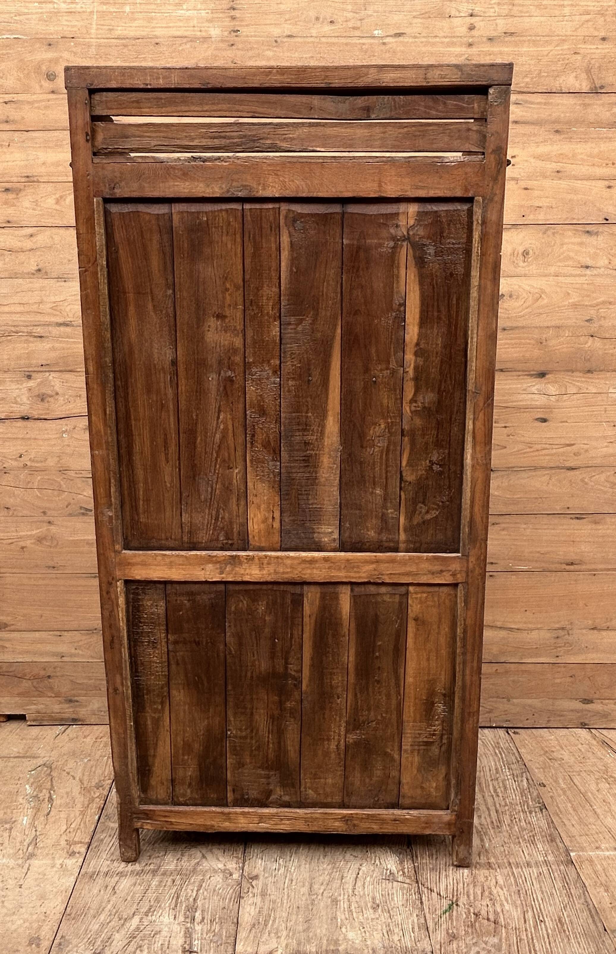 Art Deco glass-fronted cabinet in Burmese teak with original patina.