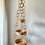 Large wicker suspension with three baskets, twisted ring chain.
