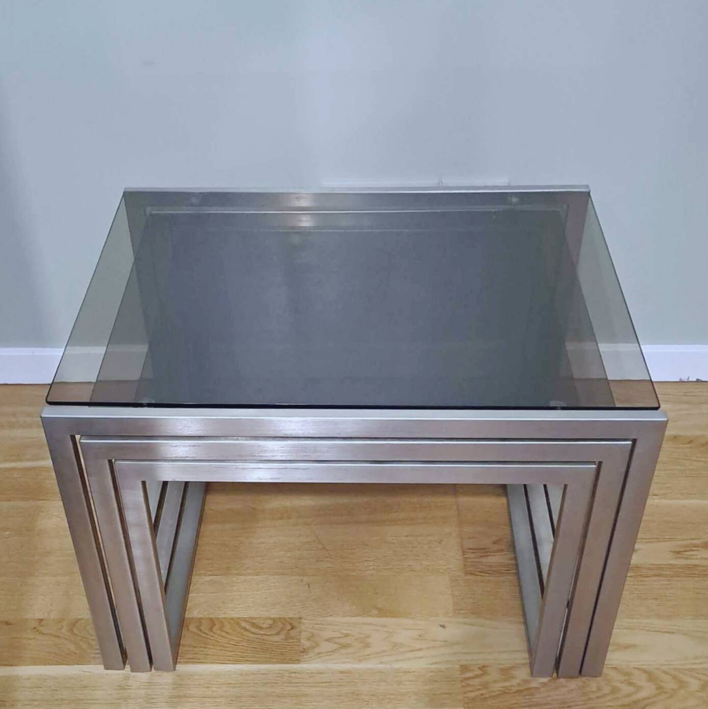 Chrome and smoked glass designer nesting table