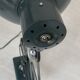 Vintage 1950s green lacquered sheet metal workshop wall light with accordion arm.