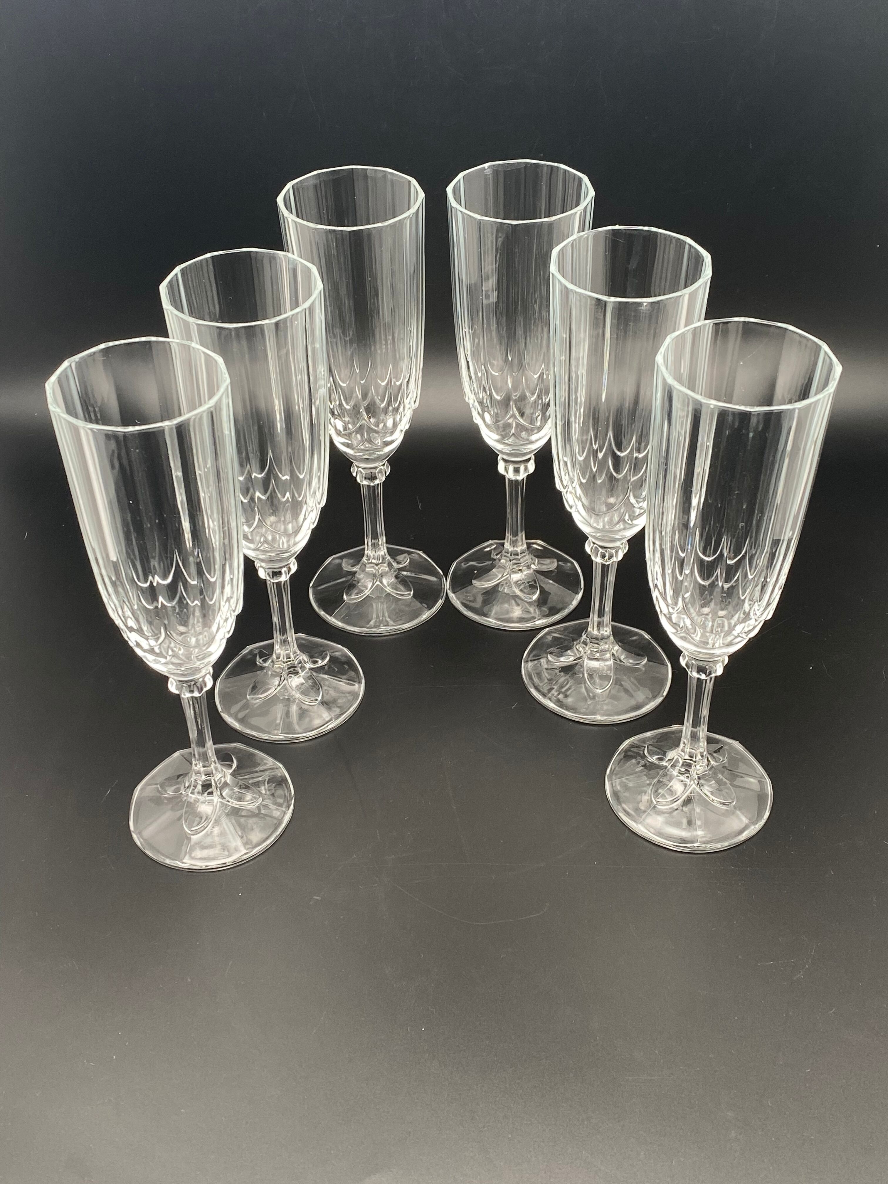 Champagne flutes in worked glass
