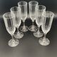 Champagne flutes in worked glass