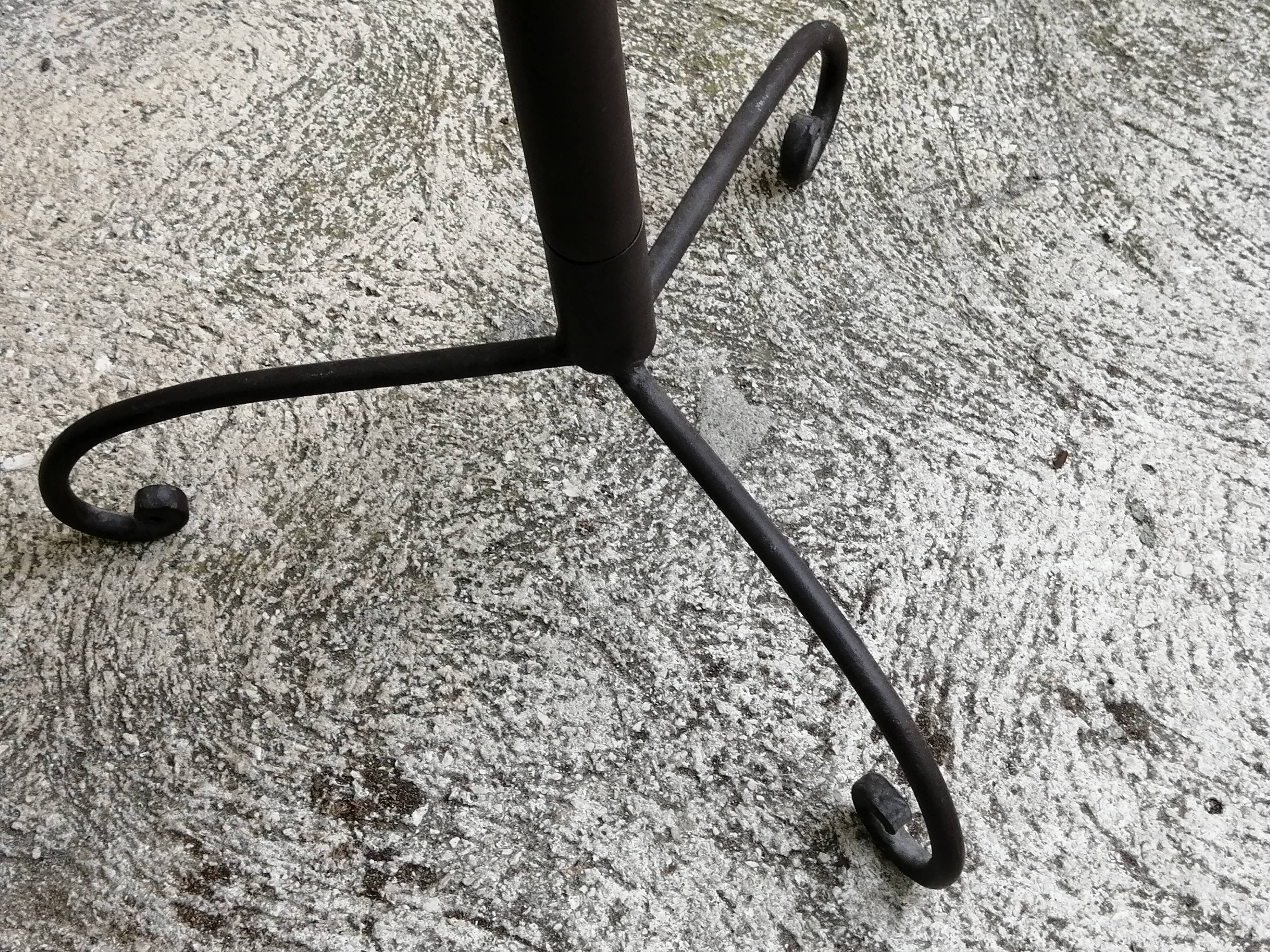 Model on a wicker stand.