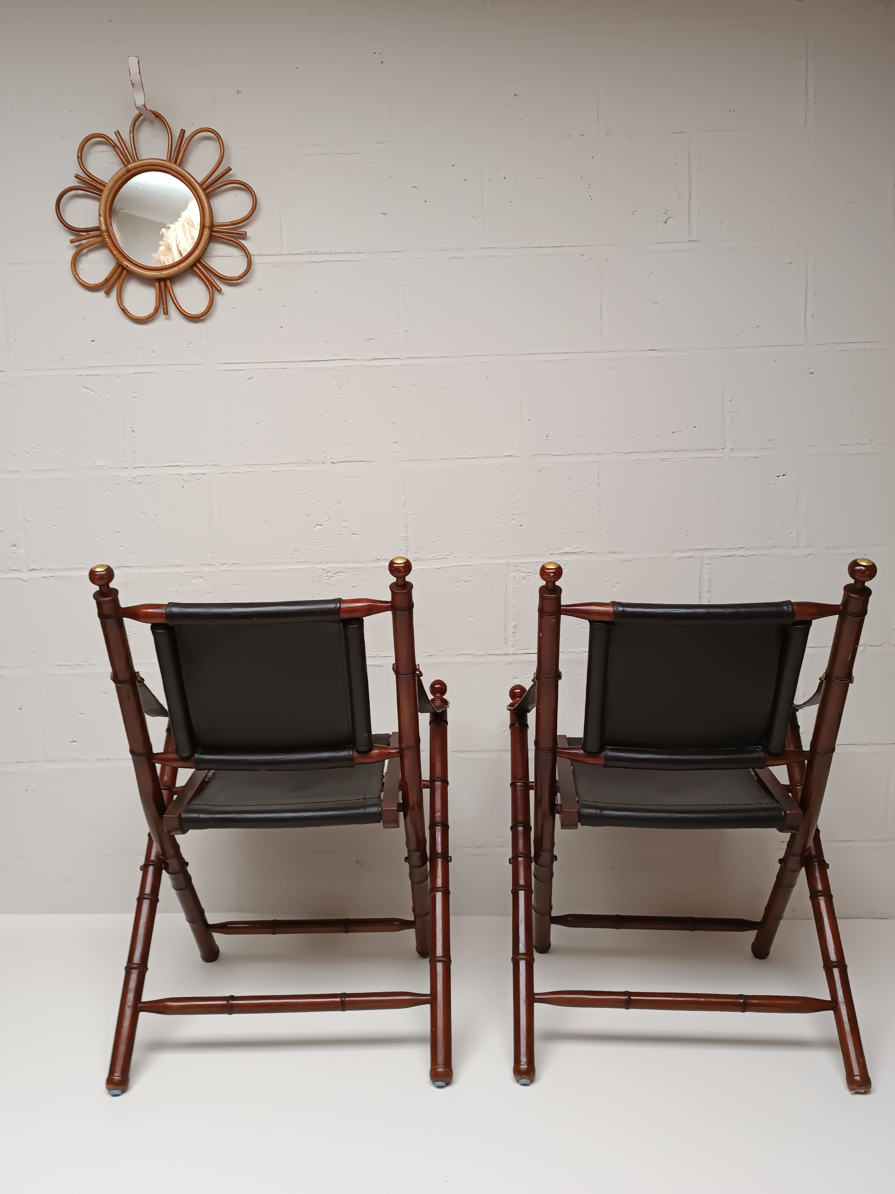 Pair of vintage "safari" folding armchairs in mahogany and leather