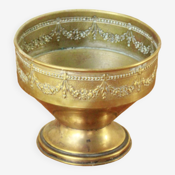 Old brass pot cover
