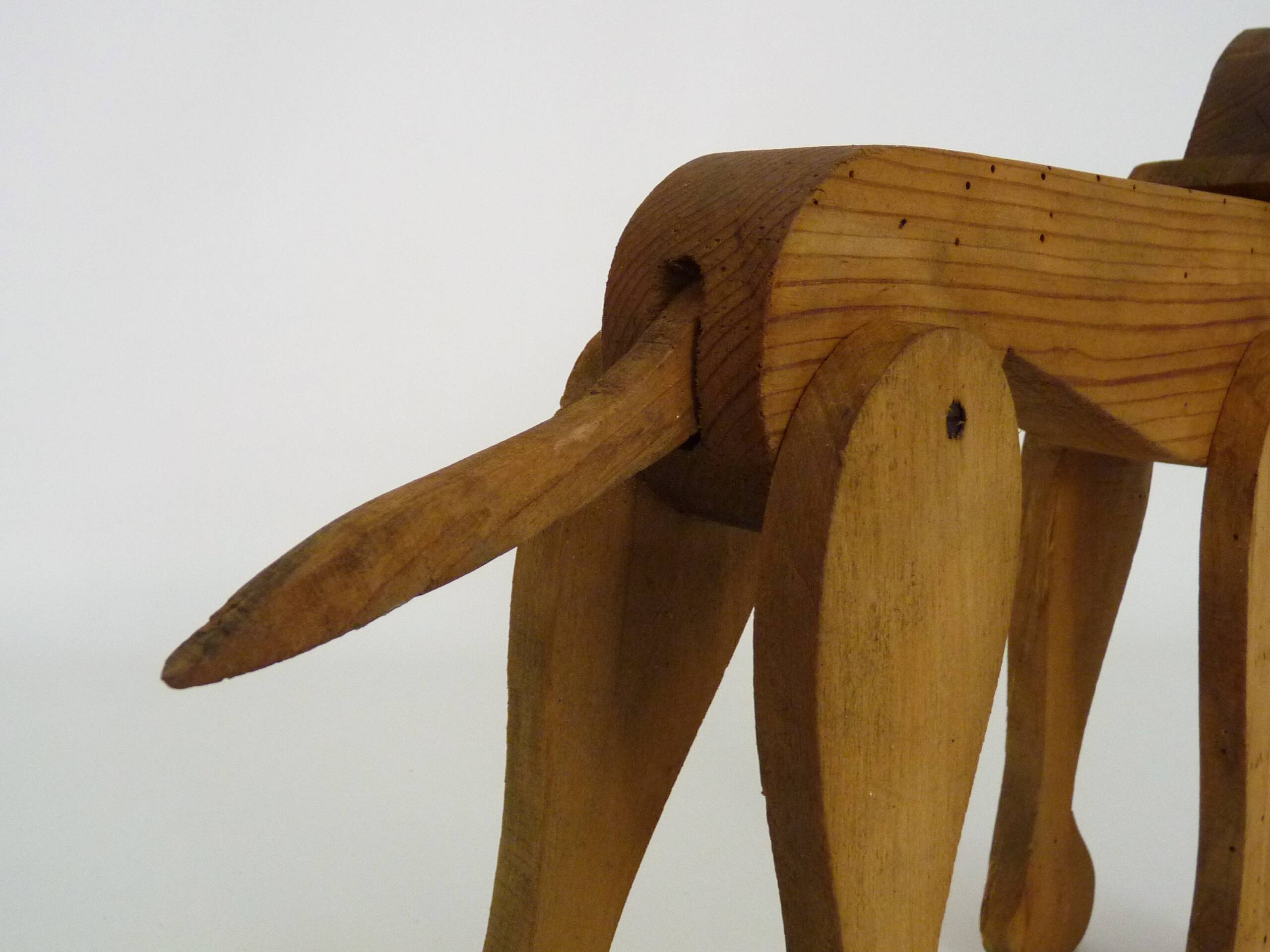 Articulated wooden dog toy. 1940s