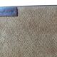 Letter holder covered in leather and golden metal by roche design