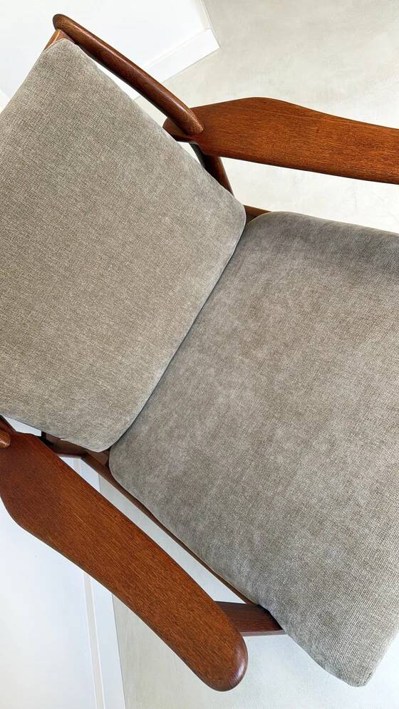 Vintage teak wooden armchair