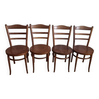 Set of 4 Baumann bistro chairs with round seats.