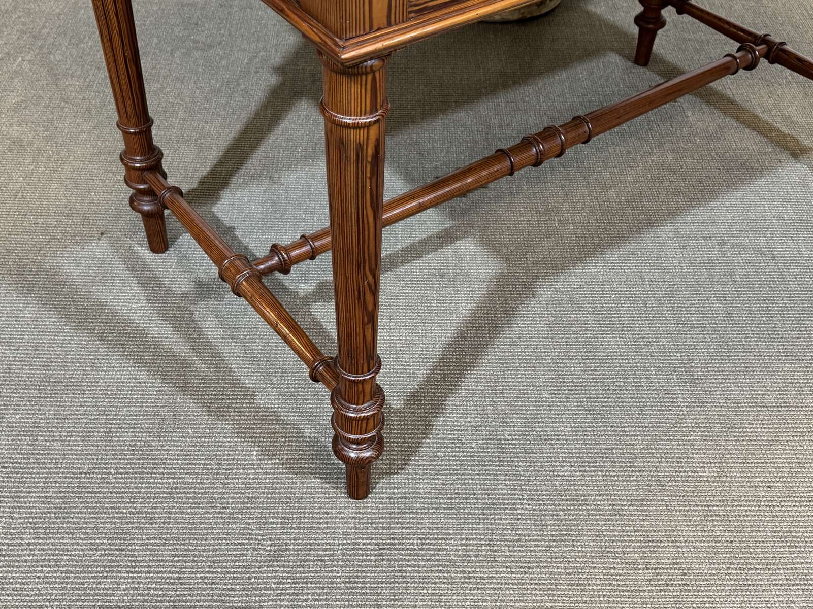 Desk table from the early 20th century in pitch pine.