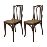2 chairs in curved wooden and canning