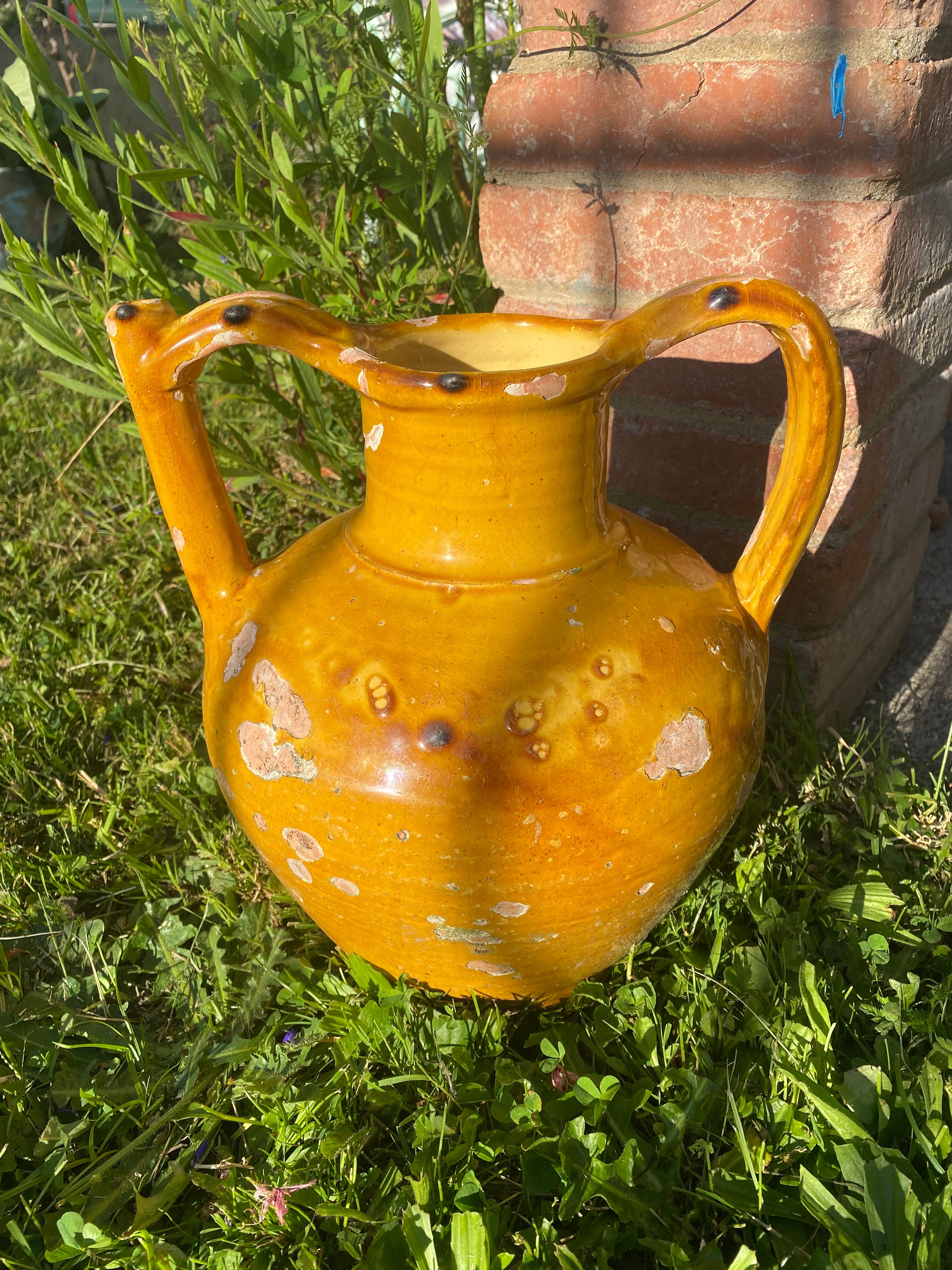 Ancient yellow glazed terracotta oriole