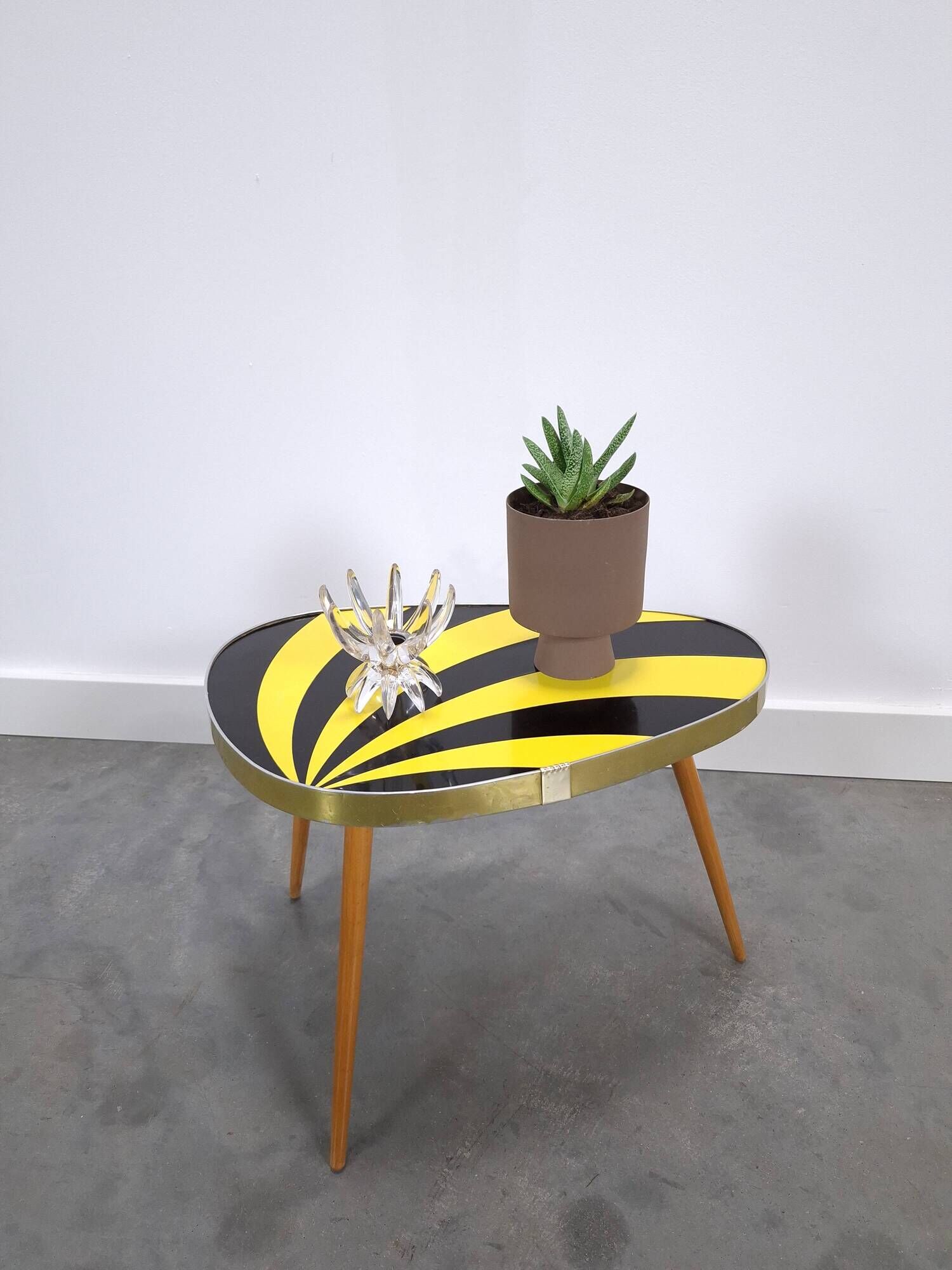 Vintage 1950s black and yellow striped formica table, plant table.