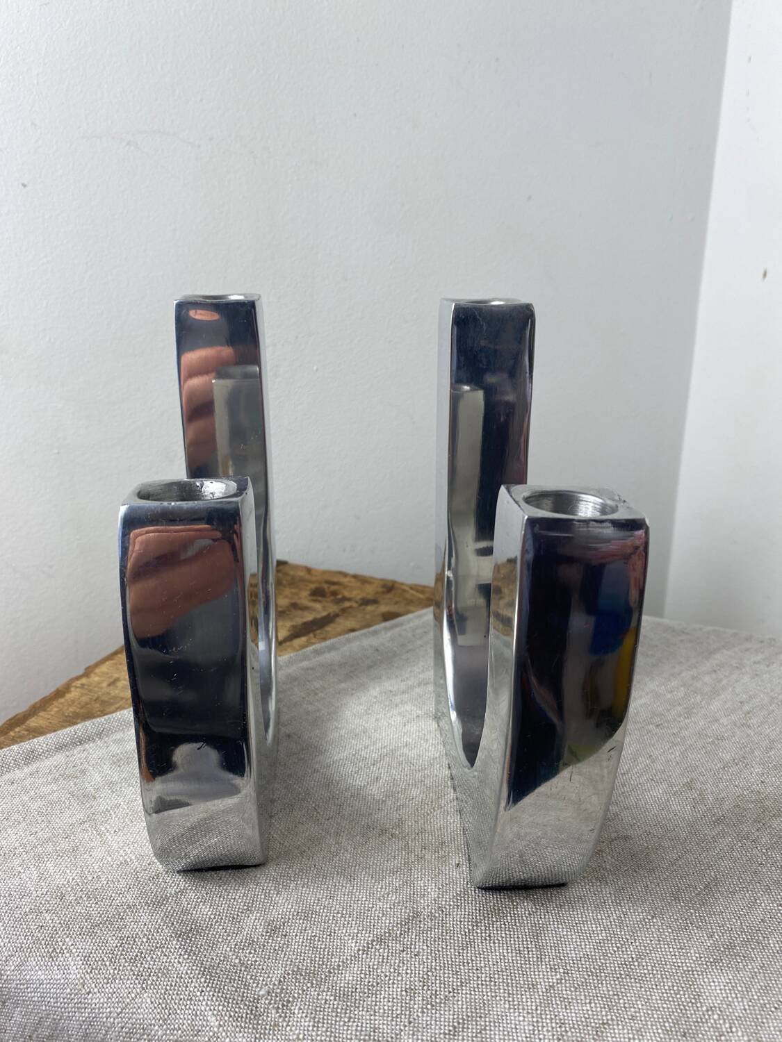 Designer candle holders in brushed aluminum