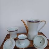 Coffee pot, sugar pot, 1 cup and saucer.