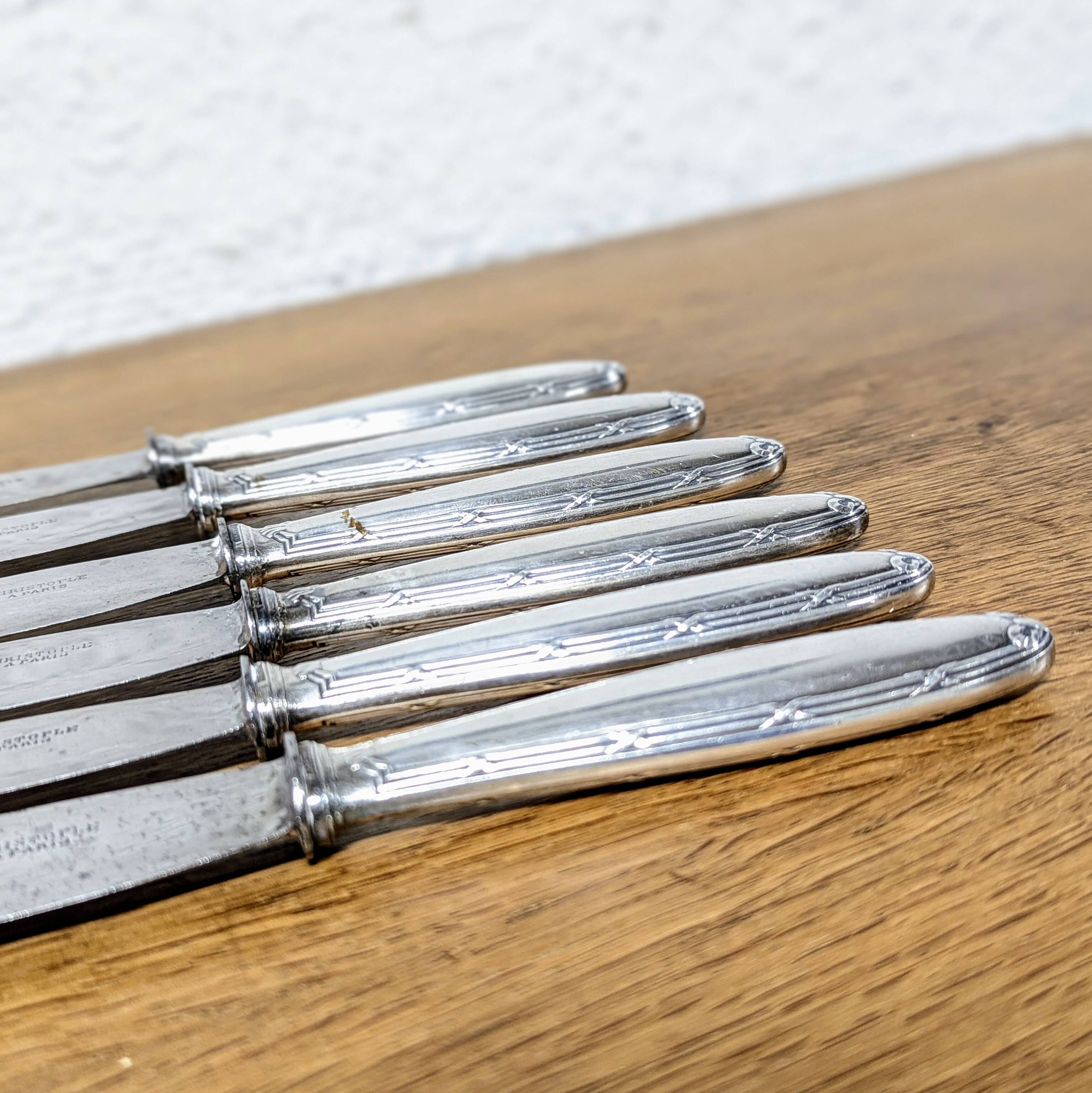 6 Christofle silver-plated metal knives