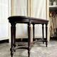 Dark wood piano bench