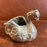 Empty pocket - bronze swan
