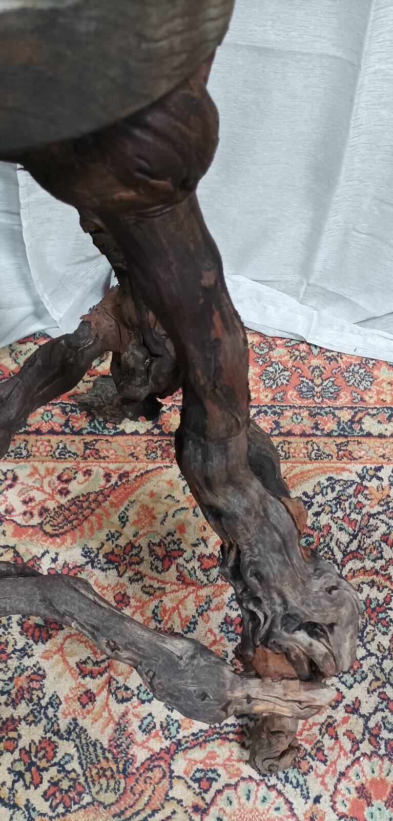 Brutalist bar stool made of vine wood