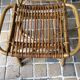 Rattan armchair and his feet rest