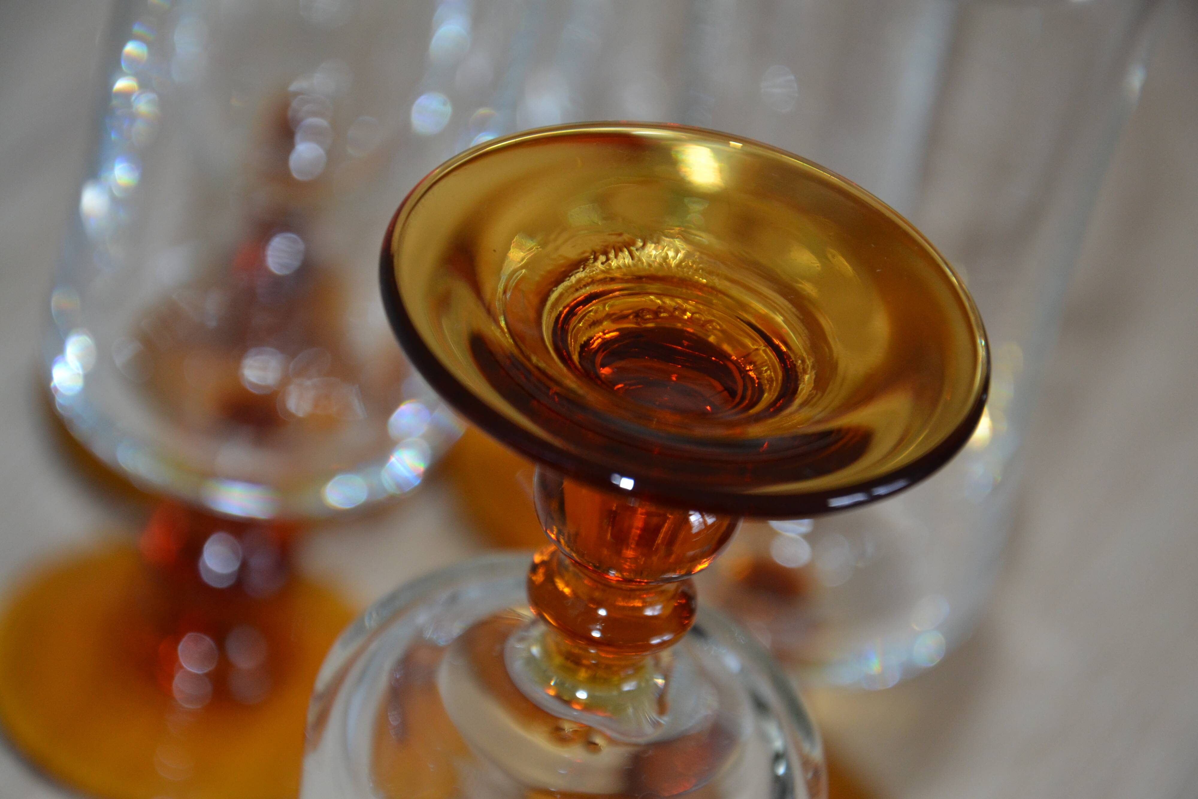 Champagne glasses with amber stems