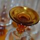 Champagne glasses with amber stems
