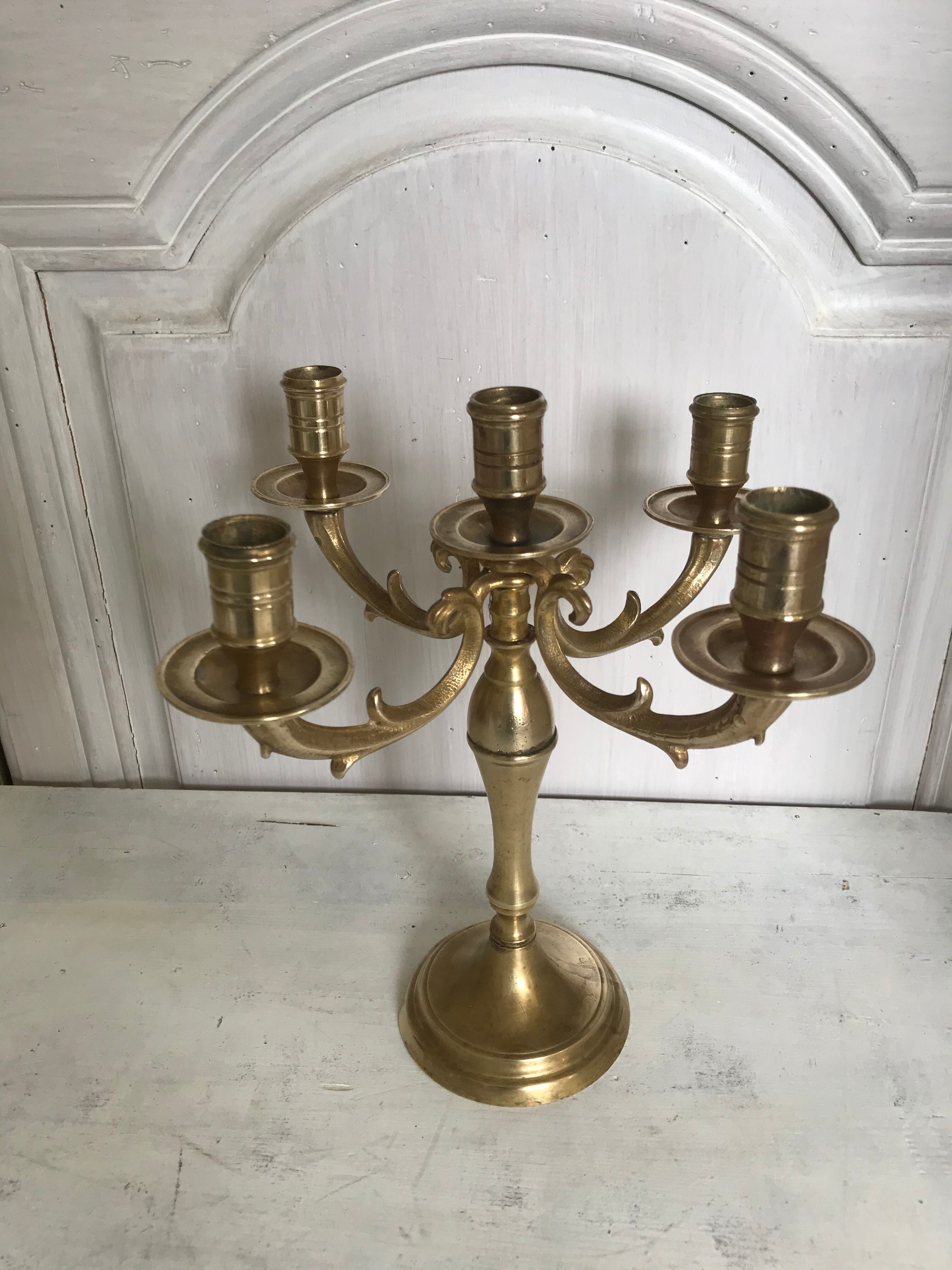 Ancient gilded bronze candlestick