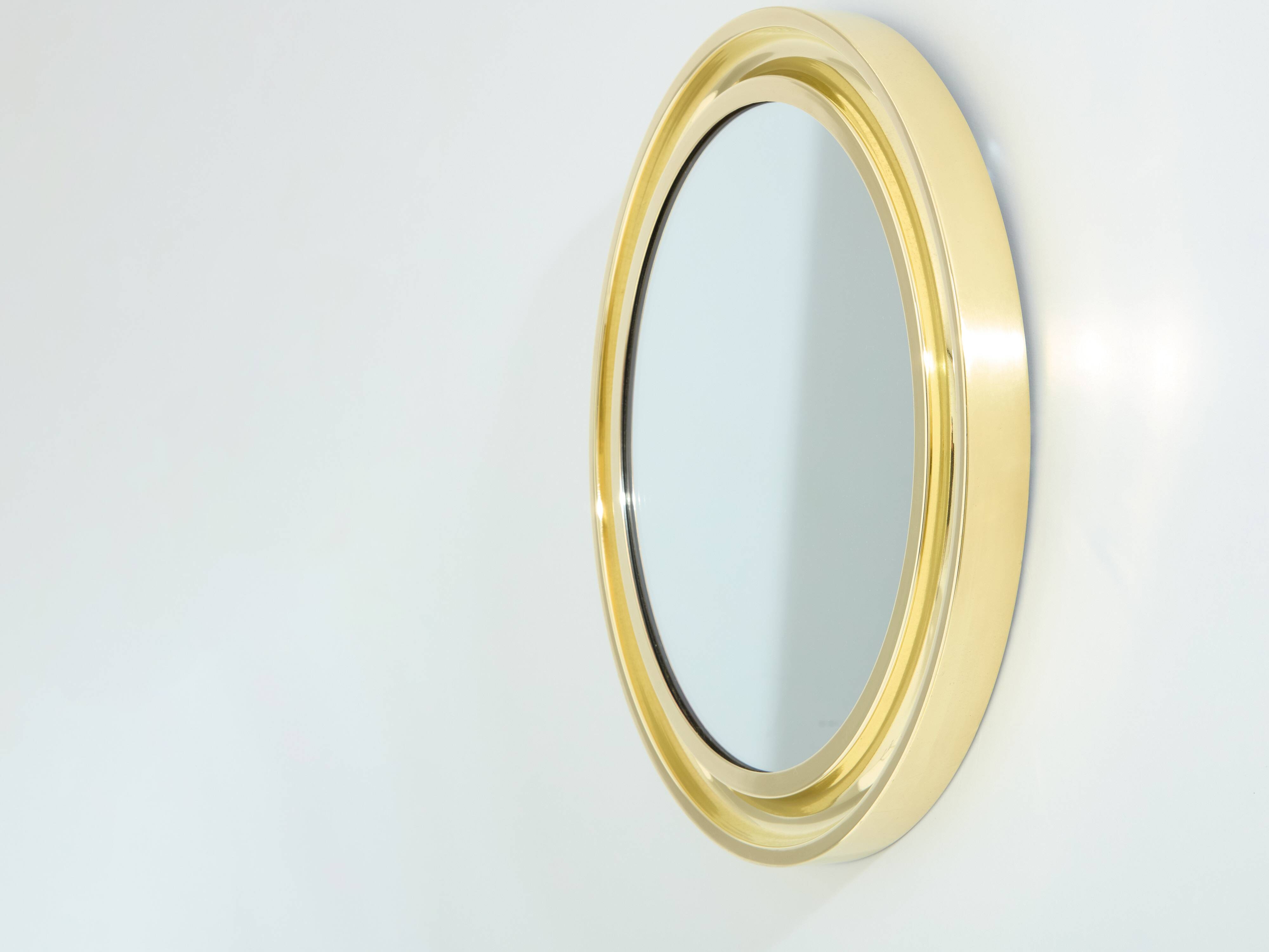 Round brass mirror by Sergio Mazza for Artemide 1960s
