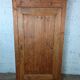 Antique rustic wardrobe in raw wood