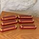 6 knife holders in burgundy glazed ceramic with art deco gold edging