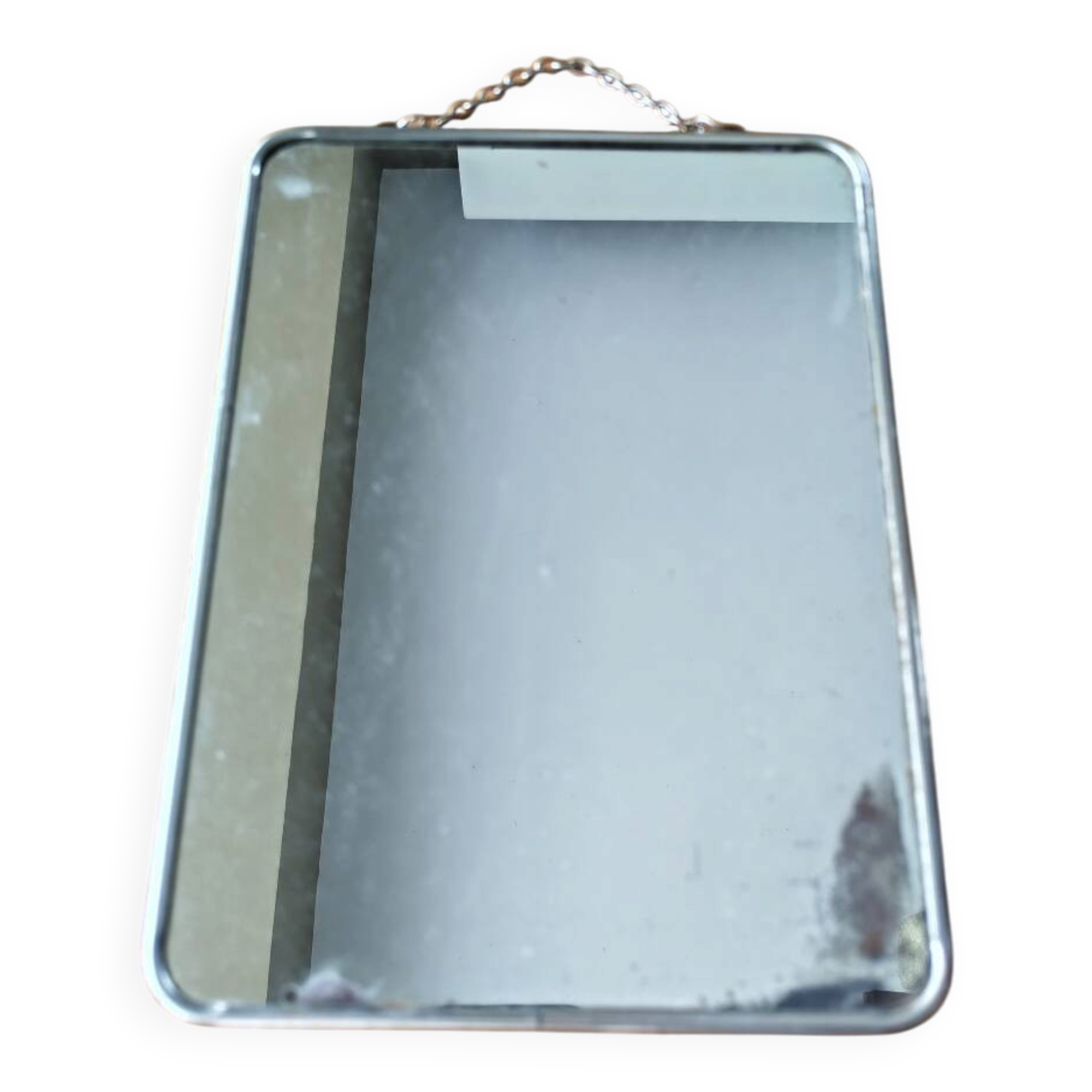 Vintage barber mirror with chain.