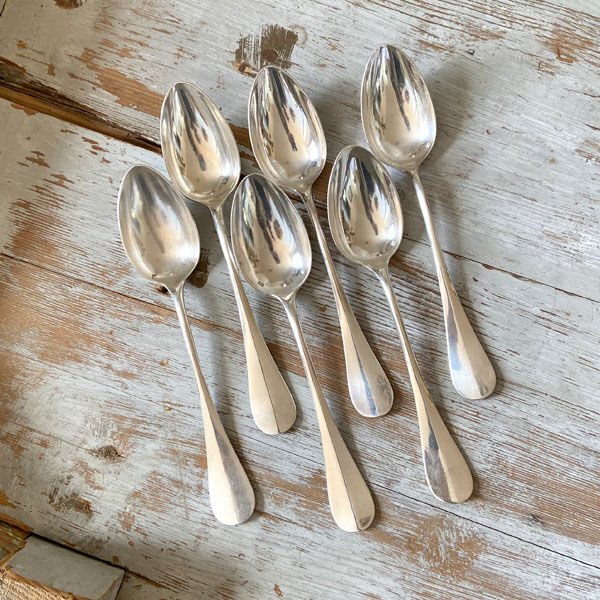 Series of 6 large silver metal spoons
