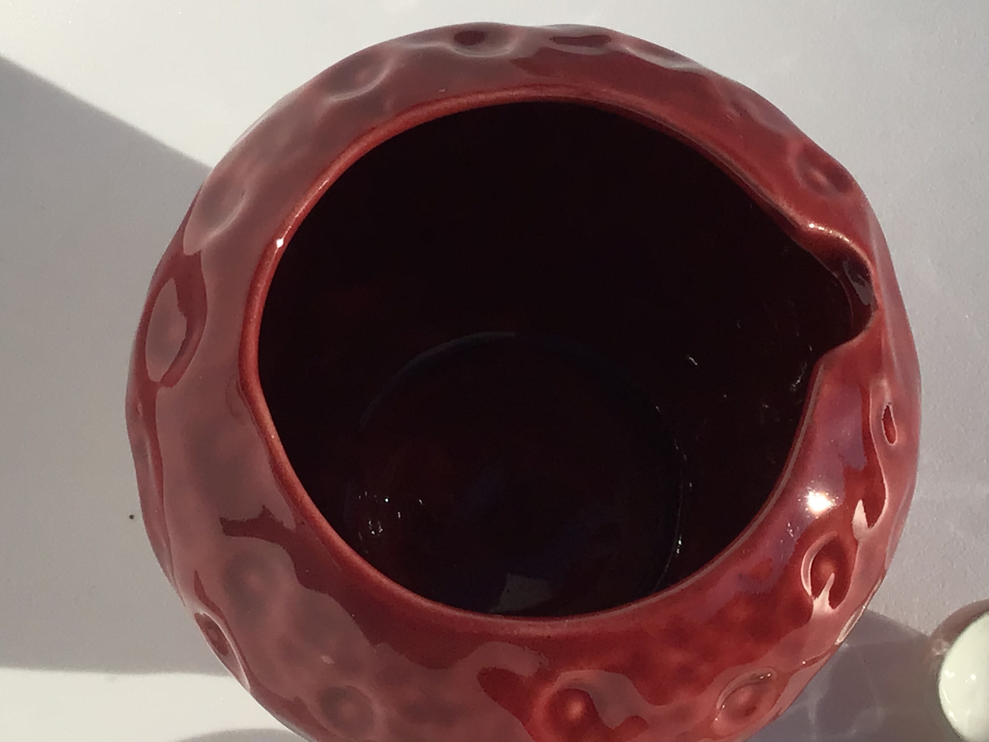 Slurry strawberry jam jar