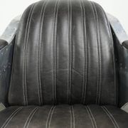 Cow leather aviator design armchair finished with aluminium and rivets