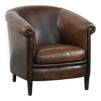 Vintage sheepskin club armchair with beautiful patina and warm colours