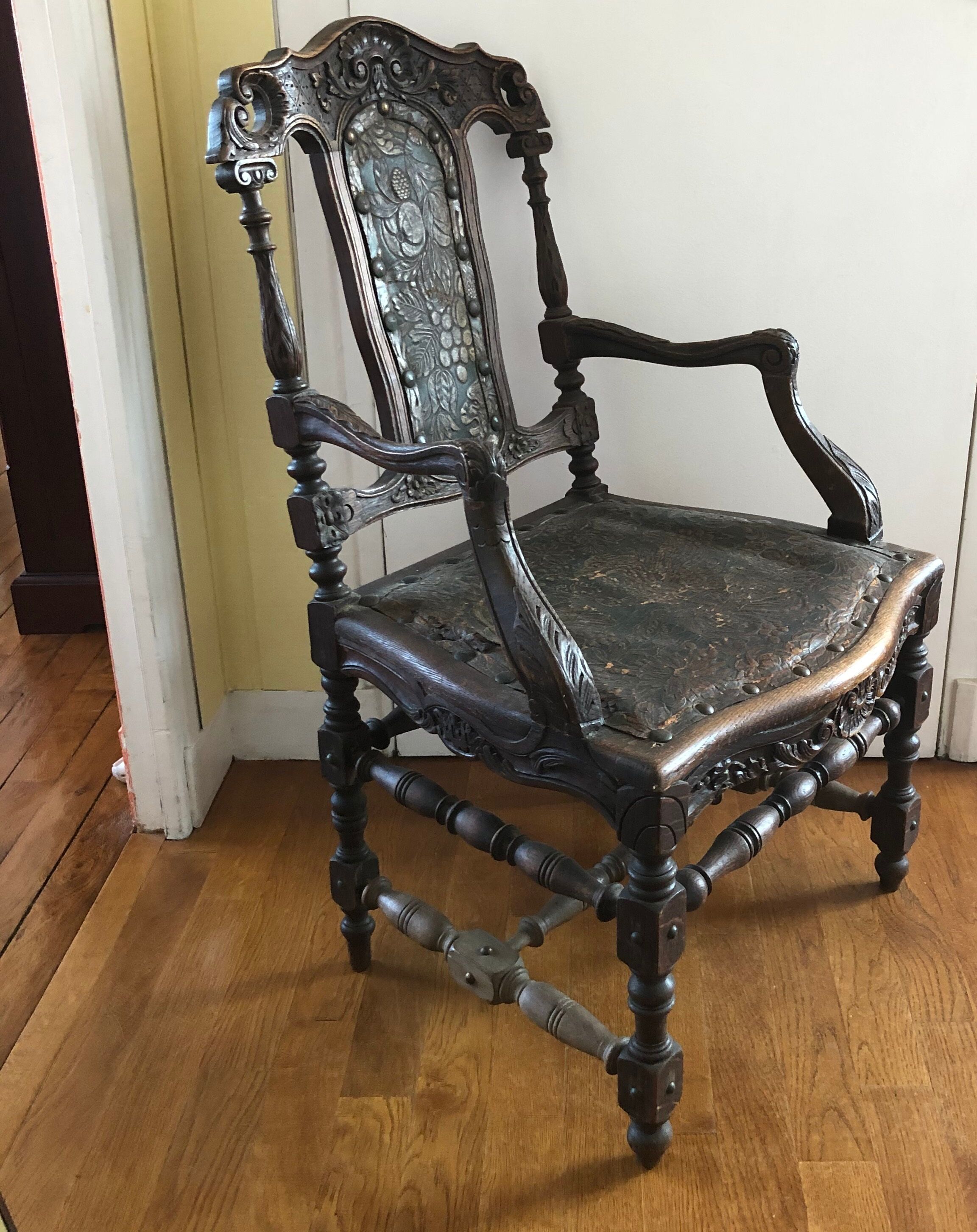 Old carved wooden armchair