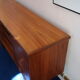 60s teak row, two sliding doors