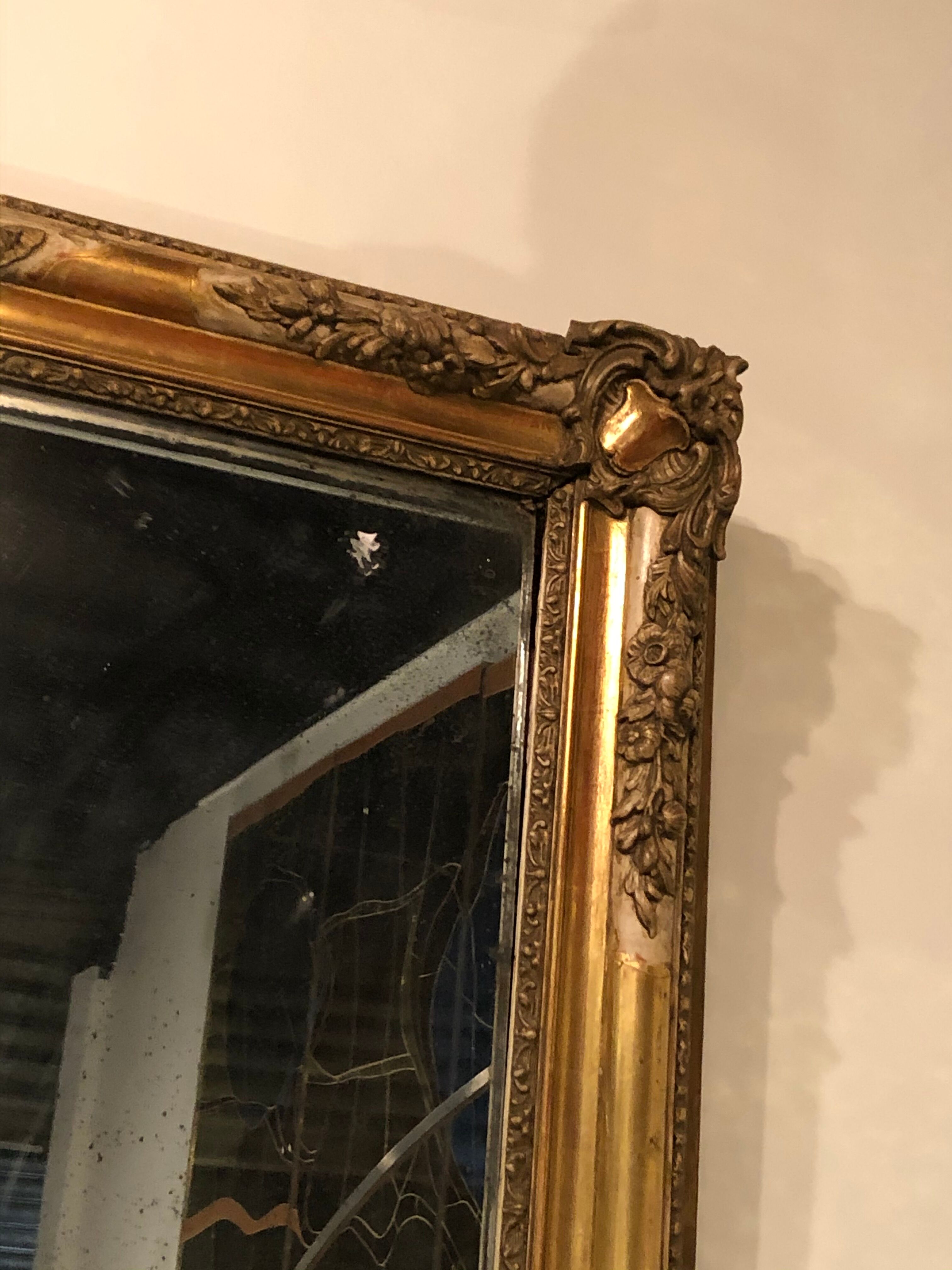 Miroir d'époque Restauration en bois stucké doré - 125x78cm