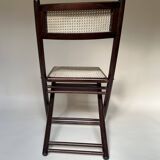 Set de quatre chaises pliantes en bois et cannage