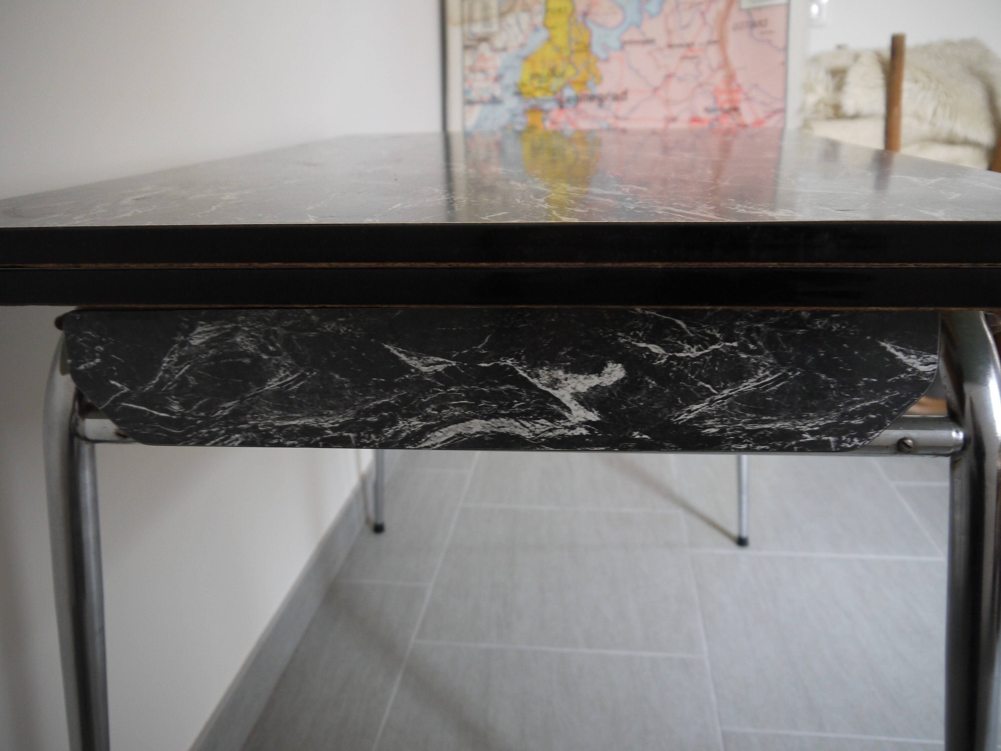 Black and white marbled formica table