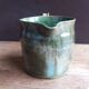 Handcrafted enameled terracotta pitcher signed