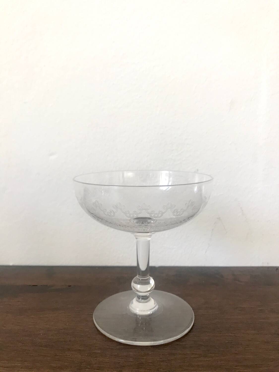 Set of 9 antique champagne glasses in engraved glass