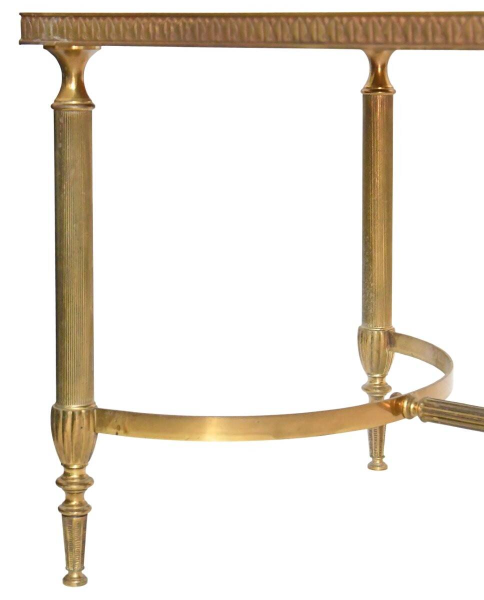 Coffee table in gilded brass with a mirrored eglomisé glass top.
