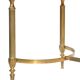 Coffee table in gilded brass with a mirrored eglomisé glass top.