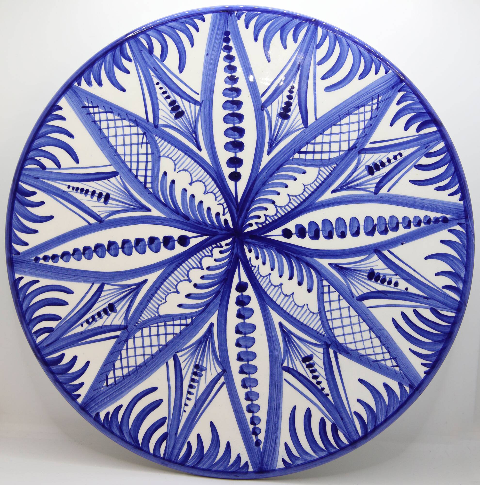 Xl dish from Spain with hand-painted blue rosette