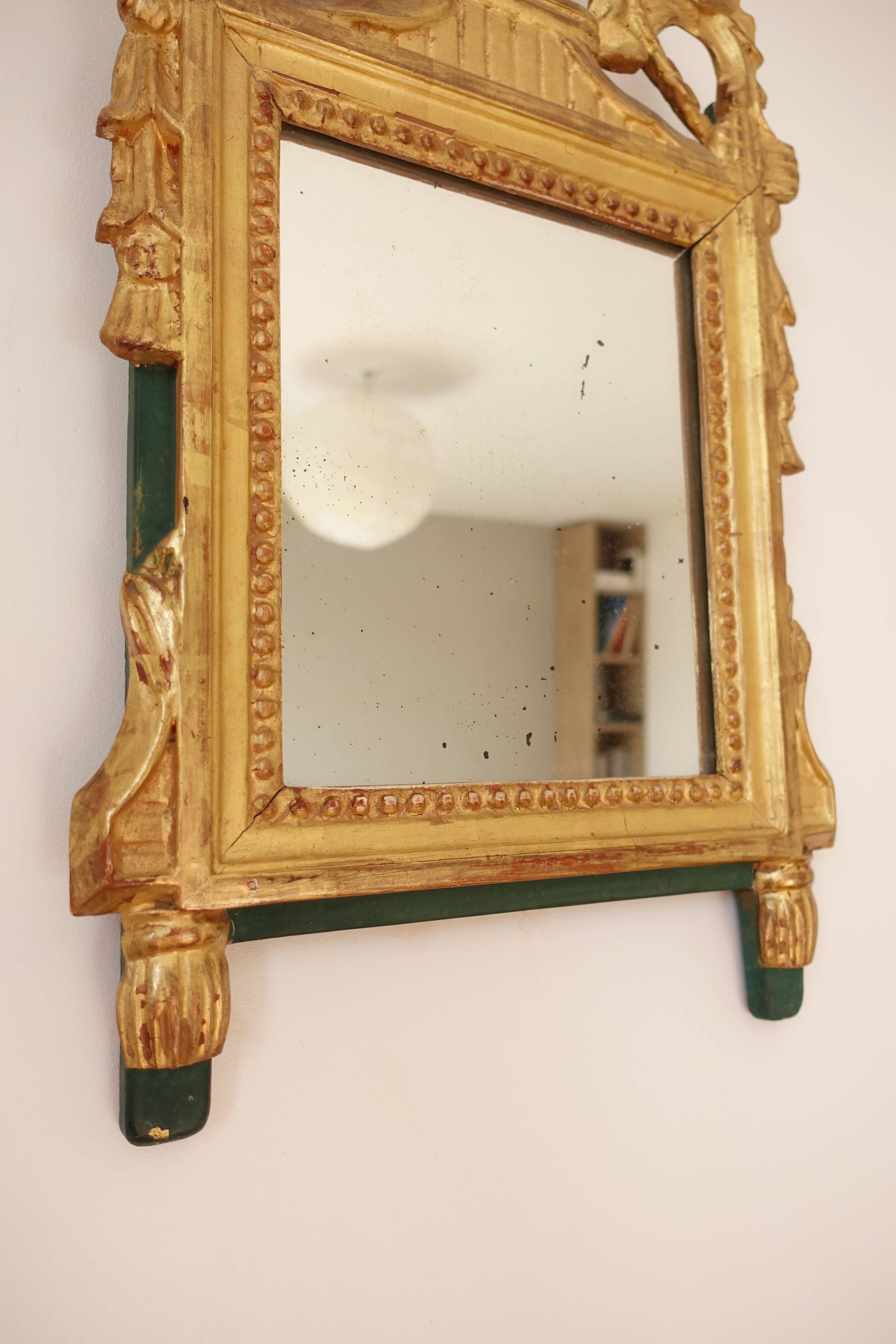Miroir Louis XVI en bois doré 35x 65cm